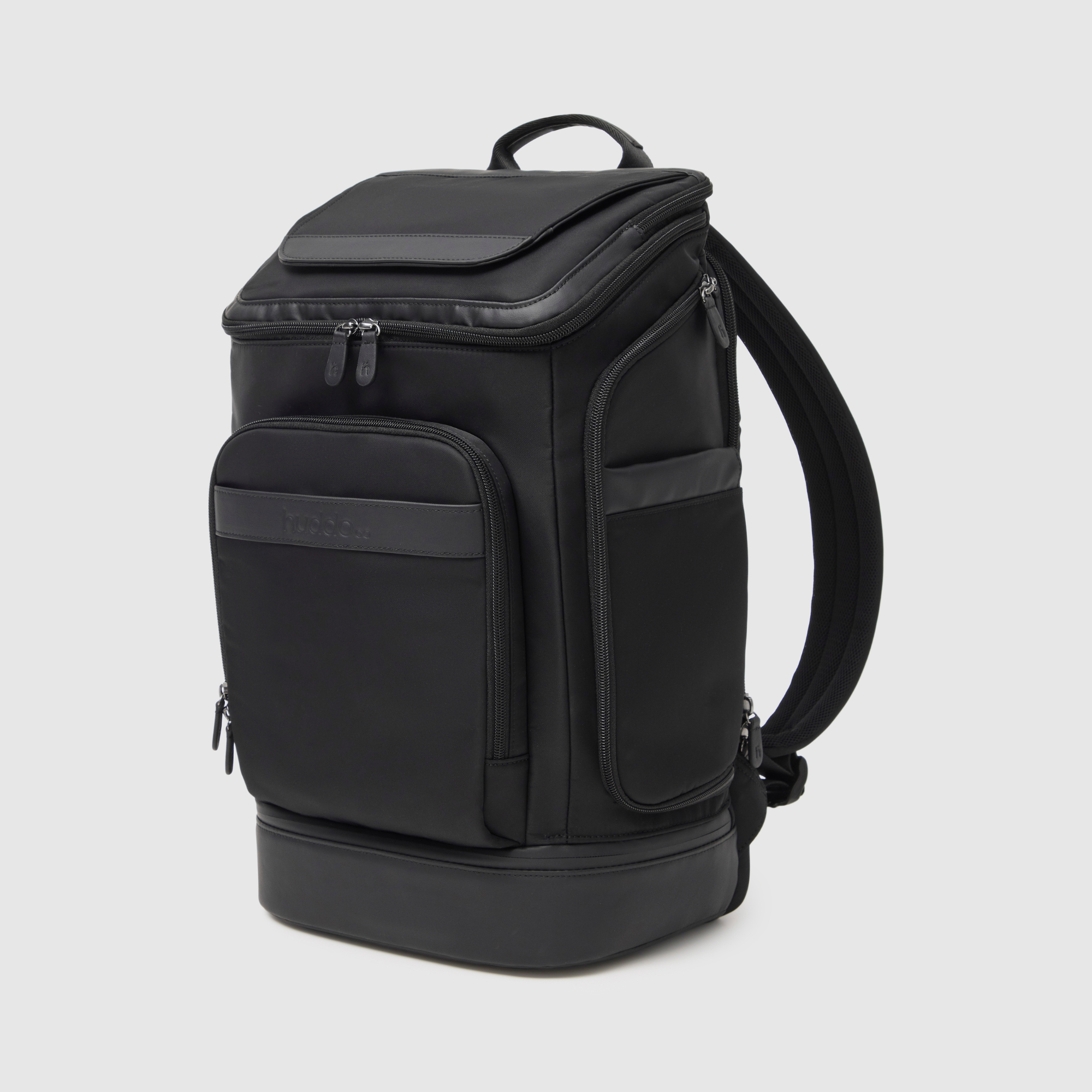 huddoco anywhere baby backpack with pineapple leather and recycled nylon - front corner angle