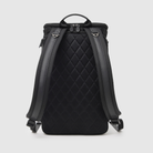 huddoco anywhere baby backpack with pineapple leather and recycled nylon - back corner angle showing airmesh back panel, shoulder straps with leather feature and grab handle reinforced with leather